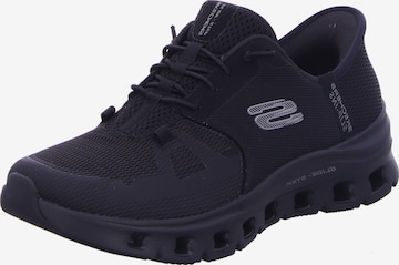 Baskets basses SKECHERS en noir : devant