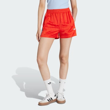 Loosefit Pantaloni di ADIDAS ORIGINALS in arancione: frontale