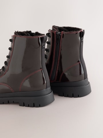 Bottes Next en rouge