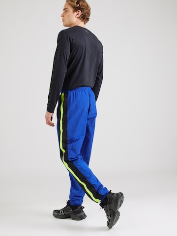 UNDER ARMOUR Конический (Tapered) Спортивные штаны в Синий