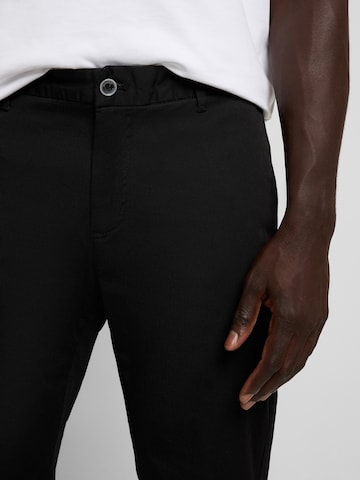WOTEGA Regular Chino Pants in Black