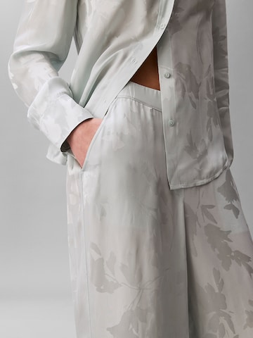 Calvin Klein Wide leg Pleat-front trousers in Blue