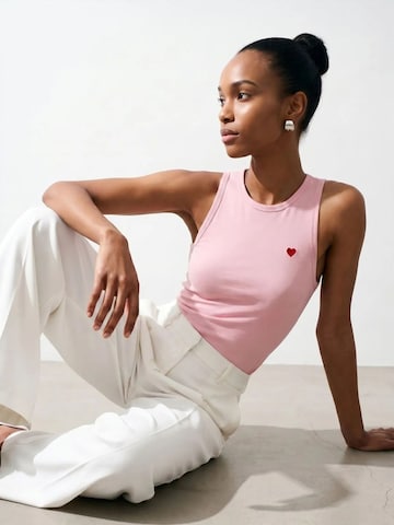 Top di Dilvin in rosa