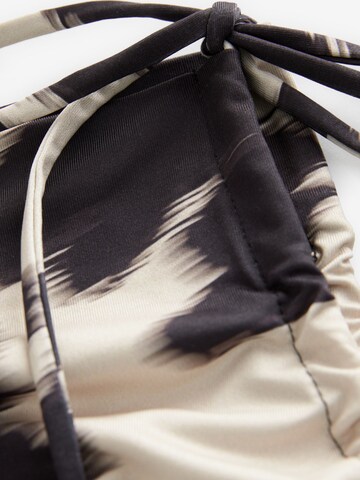 Haut Next en beige
