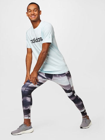 ADIDAS SPORTSWEAR Skinny Urheiluhousut 'Allover Print ' värissä monivärinen