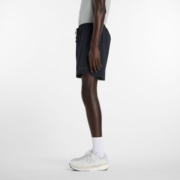 new balance - Regular Calças de desporto 'RC Essential Short 7"' em preto