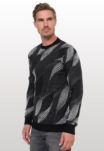 Rusty Neal Pullover in Schwarz: Vorderseite