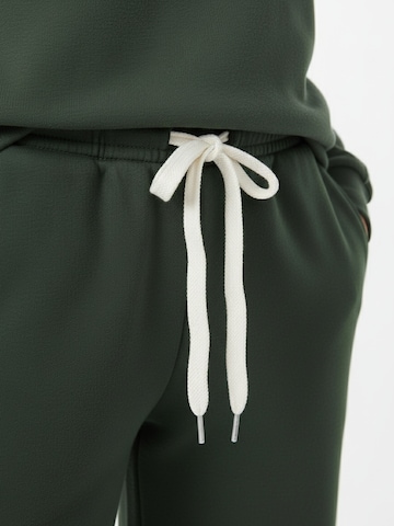 studioselectWide Leg/ Široke nogavice Hlače 'Lola' - zelena boja