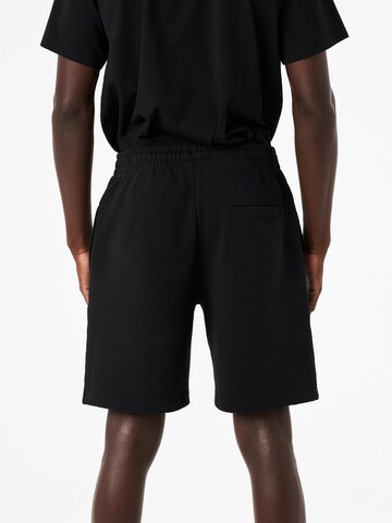 Carnales - Loosefit Pantalón en negro