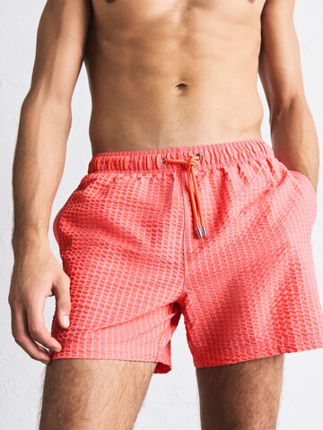 Next Плавательные шорты в Ярко-розовый: спереди