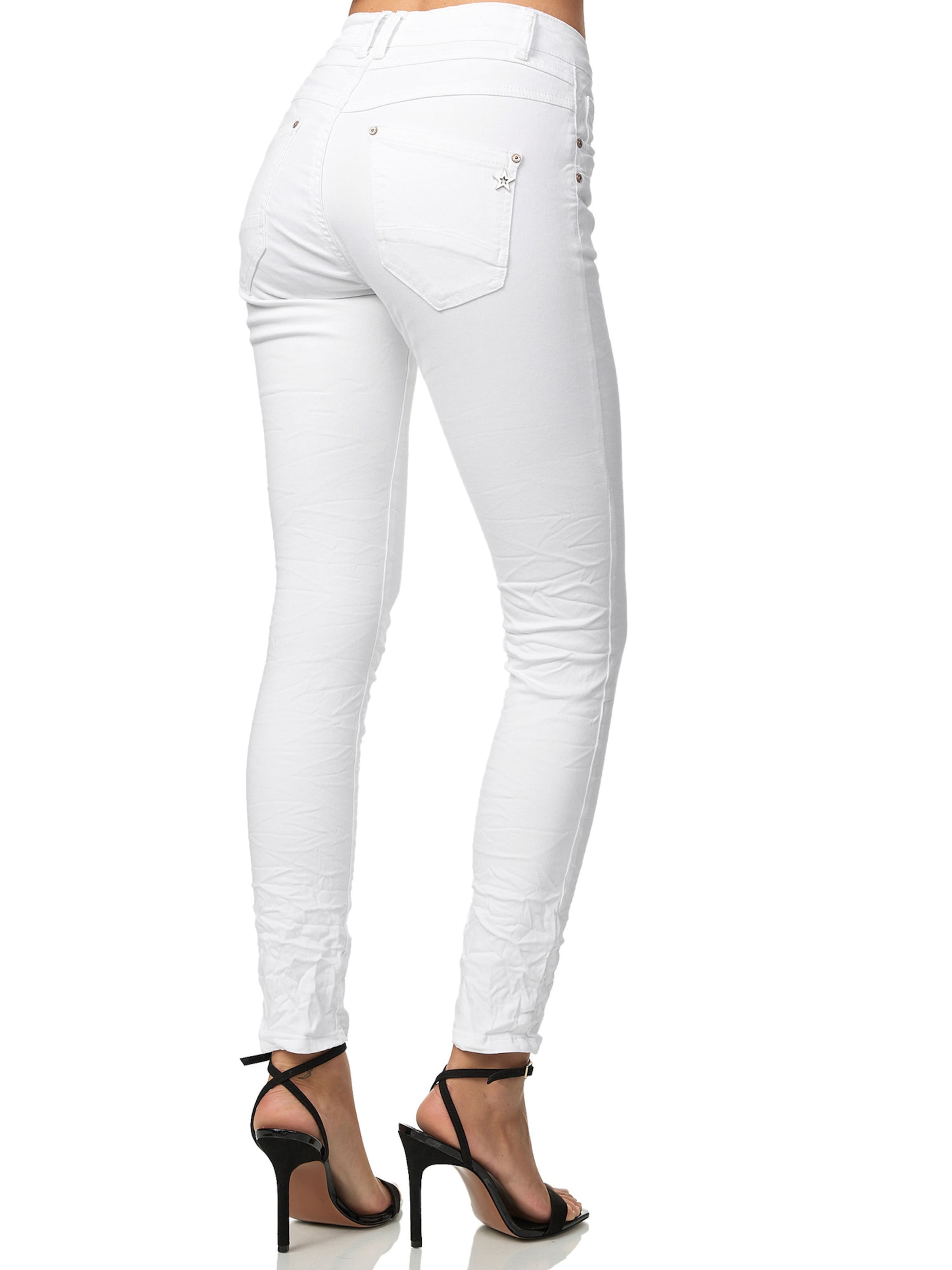 Skinny Jeans di Elara in bianco