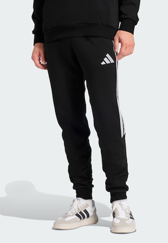 ADIDAS PERFORMANCE - Tapered Calças de desporto 'Tiro26 League' em preto: frente