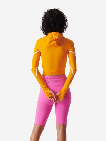 ADIDAS BY STELLA MCCARTNEY - Camisa funcionais 'Truepace Long' em laranja