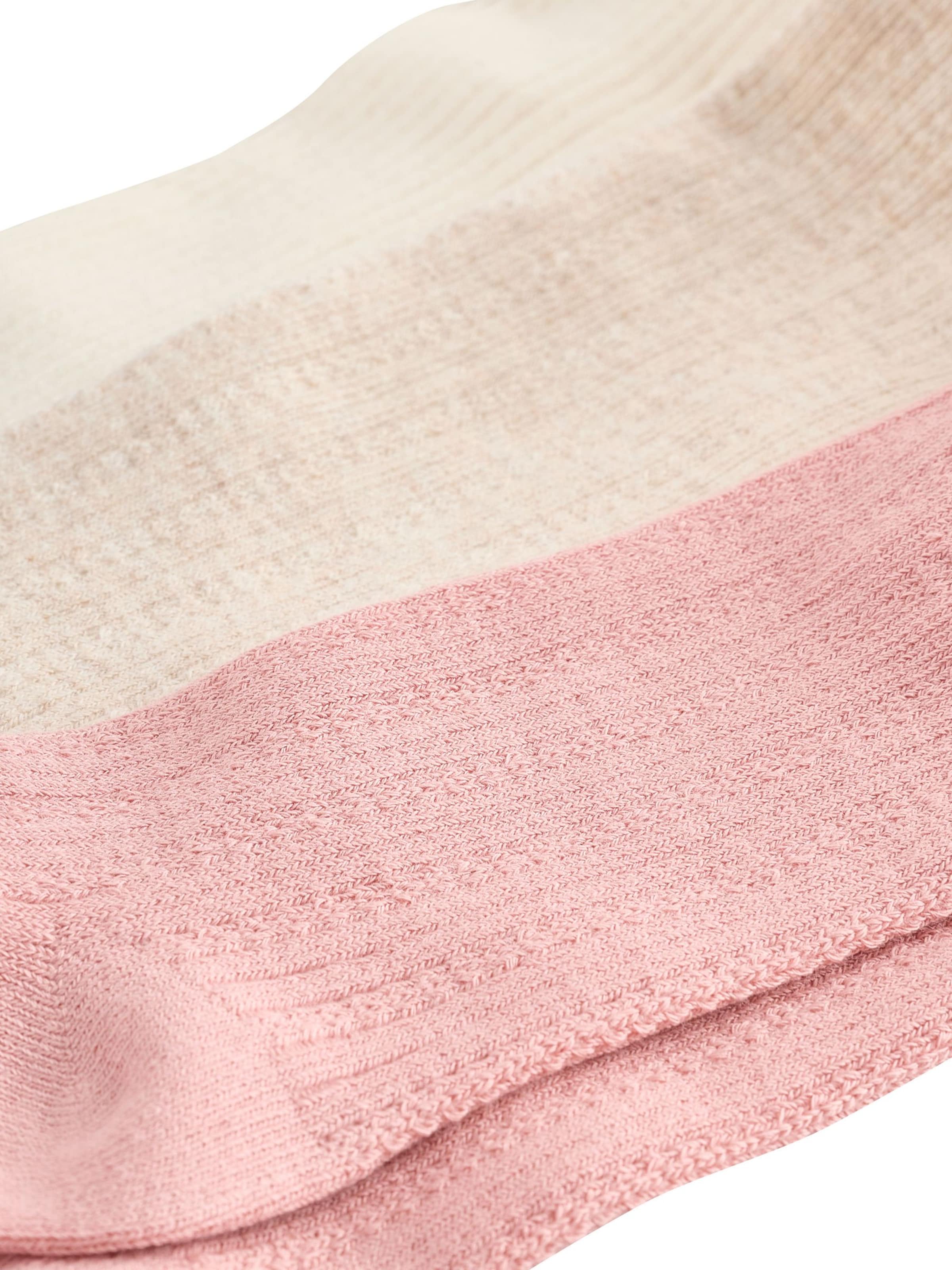 Next Kousen in Beige