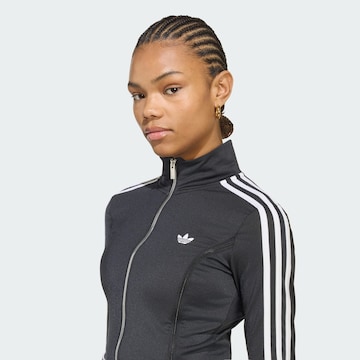 ADIDAS ORIGINALS - Sudadera con cremallera en negro