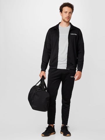 Calvin Klein Sport بدلة للجري بلون أسود
