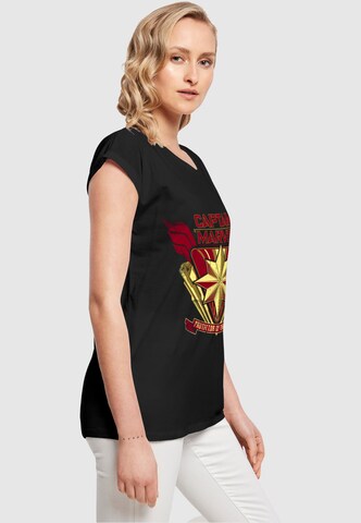 ABSOLUTE CULT Shirt 'Captain Marvel - Protector Of The Skies' in Zwart