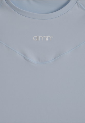 Maglia funzionale di Aim'n in grigio