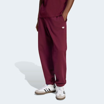 ADIDAS ORIGINALS Tapered Pants in Red: front