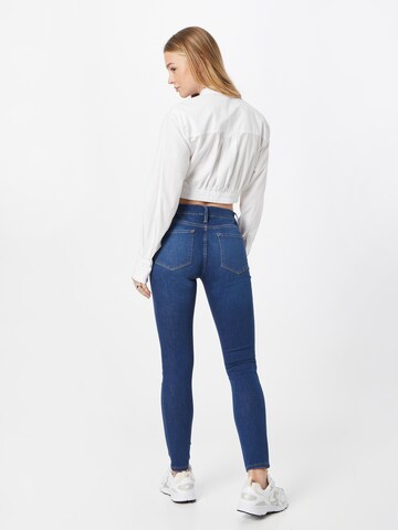 FRAME Skinny Jeans in Blau