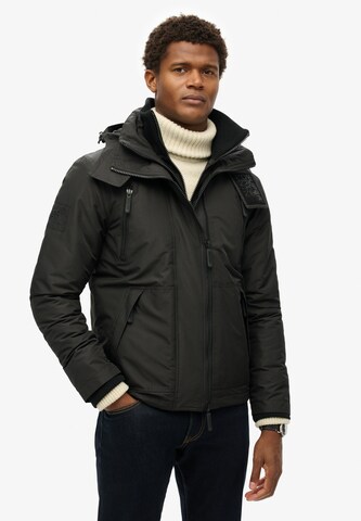 Veste mi-saison Superdry en noir : devant