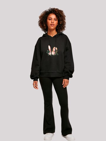 F4NT4STIC Sweatshirt 'Blumen Osterhasen Ohren Dekor' in Schwarz