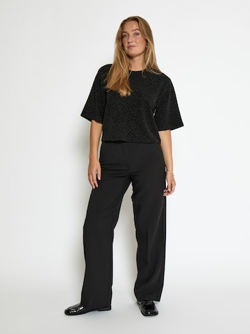 Top 'Lia' di Peppercorn in nero