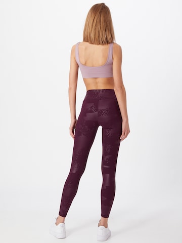 UNDER ARMOUR Workout Pants in Purple