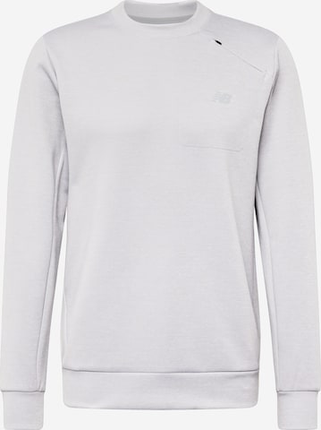 new balance - Camiseta deportiva en gris: frente