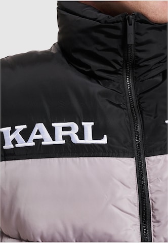 Veste d’hiver 'Essential' Karl Kani en gris