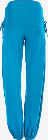 Winshape Zwężany krój Spodnie sportowe 'WH1' w kolorze niebieski