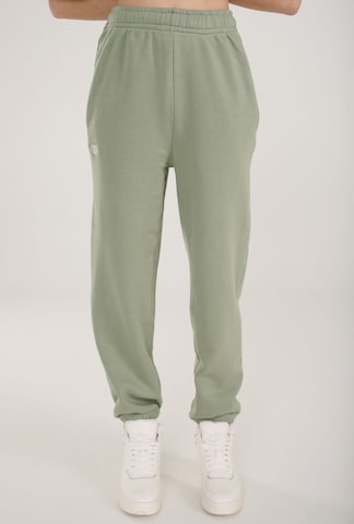 ET Nos Workout Pants in Green: front