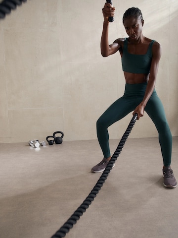 Girlfriend Collective Skinny Sportovní kalhoty ' Compressive ' – zelená