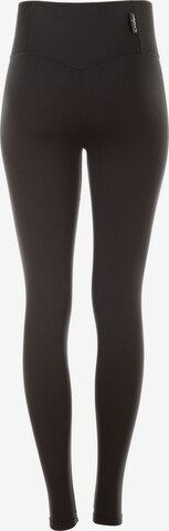 Winshape Slimfit Spodnie sportowe 'WTPL1' w kolorze czarny