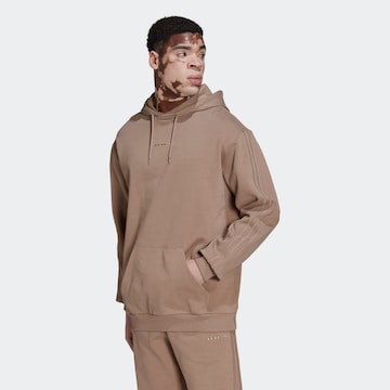 ADIDAS ORIGINALS Sweatshirt 'Reveal Ess' i brun: framsida