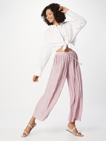 ABOUT YOU Wide leg Trousers 'Caren' in Pink
