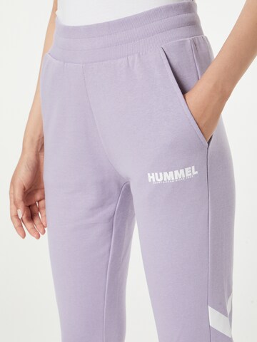 Effilé Pantalon de sport Hummel en violet