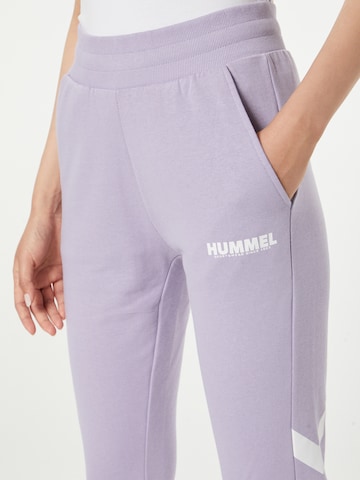 Hummel Zúžený strih Športové nohavice - fialová