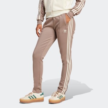 ADIDAS ORIGINALS Slimfit Hose 'Adicolor Sst' in Braun: Vorderseite