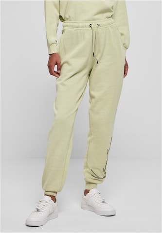 Karl Kani - Tapered Pantalón en verde: frente