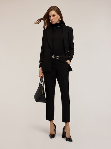 MOTIVI Regular Trousers in Black