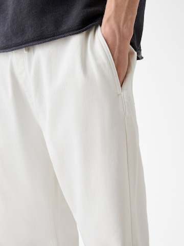 Bershka Tapered Jeans in White