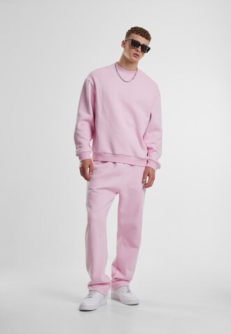 Loosefit Pantaloni di Urban Classics in rosa
