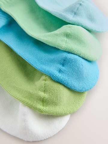 Next Sockor i blå