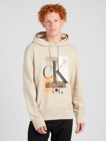 Sweat-shirt Calvin Klein Jeans en beige : devant