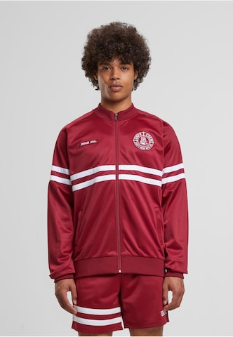 Unfair Athletics Between-season jacket in Red