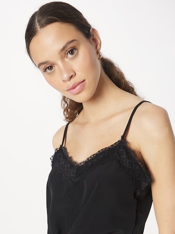 ABOUT YOU Top 'Jule' in Schwarz