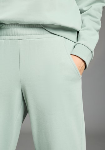 FLASHLIGHTS Loosefit Hose in Grün