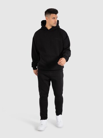 Veste de survêtement 'Rami' Smilodox en noir