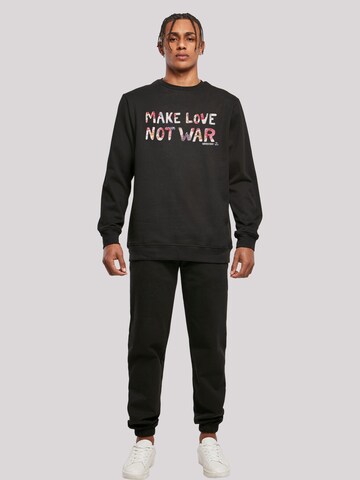 F4NT4STIC Sweatshirt 'Woodstock Music Festival Peace Make Love Not War Floral Blumen' in Schwarz